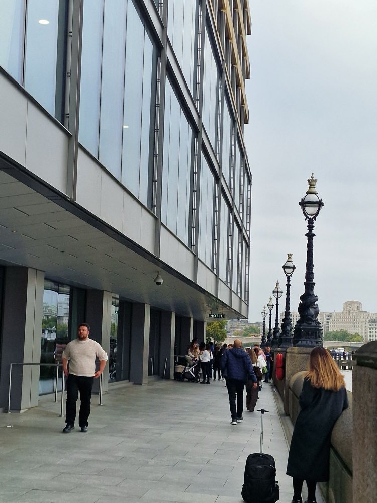 Looking up the Thames along the riverside walkway past the venue